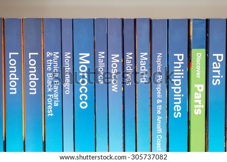 Color picture of guidebooks on a shelf