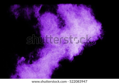 color powder explosion isolated on black background