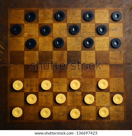Color shot of a vintage draughts or checkers board game.