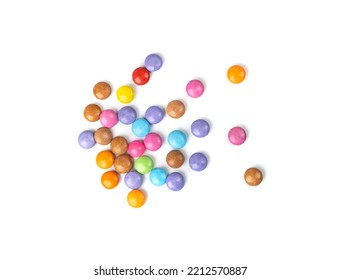 Color small candies pile isolated. Colorful dragees, multicolored glazed chocolate buttons, various dragee collection, pastel candies on white background