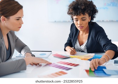 Color swatch, design and meeting with business people in boardroom of office for collaboration. Conversation, decision and palette with employee people in workplace together for creative discussion - Powered by Shutterstock