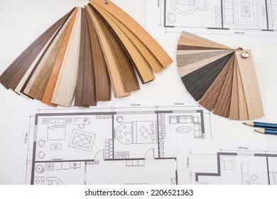 Color Swatches Palette With Pencil On House Layout Blueprint At Office Desk. Creative Project Workplace