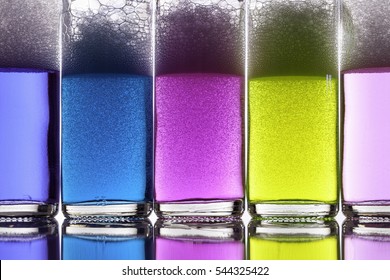 Color therapy. Brightly colored liquids or potions in glass bottles. Chemicals in neon colors.
