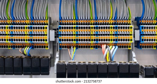 Color wires in a box of distribution of an electricity, PLC Control panel with wiring, lectric control panel enclosure for power and distribution electricity. 