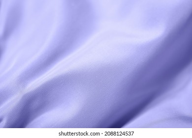 color del año 2022    Muy Peri  fondo lila mínimo con pliegues y ondas en tela  morado 