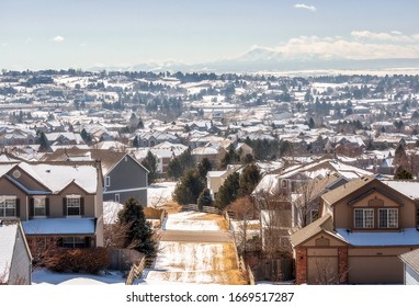 Colorado Living. Centennial, Colorado - Denver Metro Area Residential Winter Panorama with the view of a Front Range mountains on the distance