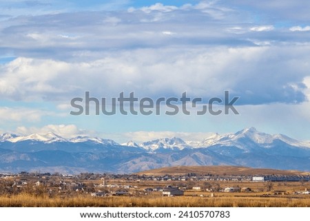 Colorado Living. Loveland, Colorado - Denver Metro Area Residential Winter Panorama with the view of Front Range mountains in the distance