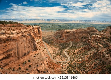 Colorado National Monument preserves one of the grand landscapes of the American West. curvy highway in the valley