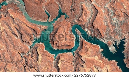 Colorado River, Lake Powell and Trachyte Canyon looking down aerial view from above – Bird’s eye view Colorado River, Utah, USA	