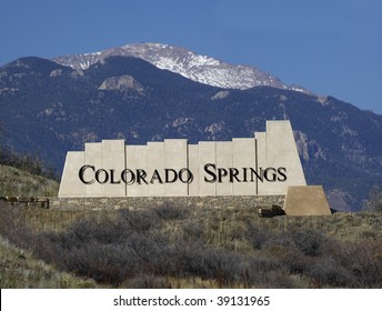 Colorado Springs City Entry Monument With Pikes Peak In The Background