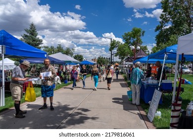 Colorado Springs, CO - July 6, 2022: People Shopping And A Man Is Collecting Signatures At The Colorado Farm And Art Market Located On The Grounds Of The Pioneer Museum Downtown.