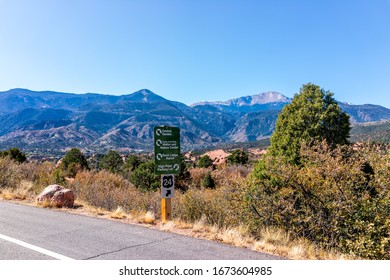 Colorado Springs, USA - October 13, 2019: View From The Garden Of The Gods In Colorado With Sign On Road For Visitor Center And Parking Lot