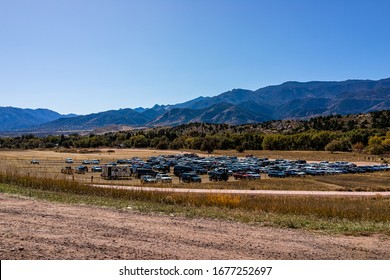 Colorado Springs, USA - October 13, 2019: View Of Parking Lot From The Garden Of The Gods In Colorado With Many Cars And Visitor Center