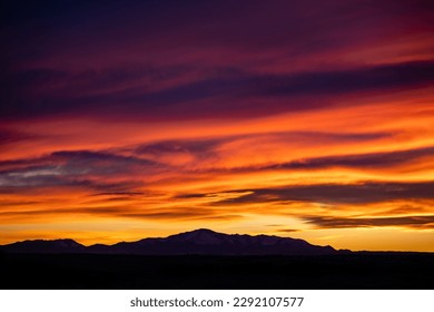 Colorado Sunset with Mountain Silhouette - Powered by Shutterstock