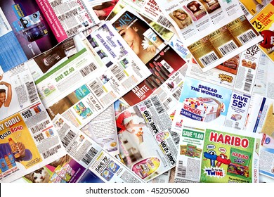 Colorado, USA - July 13, 2016: Studio shot of a pile of manufacturer coupons.