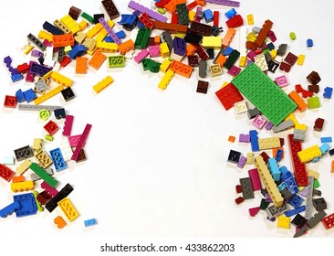 Colorado, USA - June 8, 2016: Studio shot of LEGO bricks in a pile with empty space available for text or image overlay.