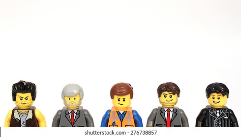 Colorado, USA - May 8, 2015: Studio Shot Of Lego Men With Text Space Above. Legos Are A Popular Line Of Plastic Construction Toys Manufactured By The Lego Group, A Company Based In Denmark.