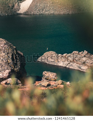 Similar – Foto Bild Strand mit Felsen und Pfütze im Sonnenuntergang, Ribadeo, Lugo, Galizien, Spanien