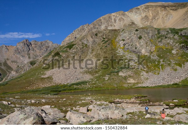 Colorado\'s Rocky Mountains - hikers at the\
Continental Divide at Herman\
Lake
