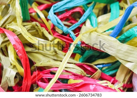 Colordul string made from plastic material is commonly called Rapia String in Indonesia