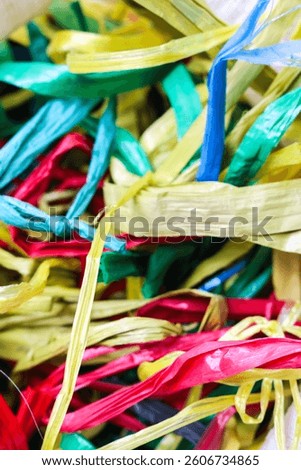 Colordul string made from plastic material is commonly called Rapia String in Indonesia