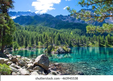Colored alpine lake in the Swiss Alps in the summer