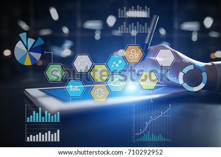 Colored applications icons and graphs on virtual screen. Business, internet and technology concept.