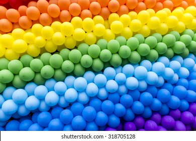colored balloons in a rainbow after the rain