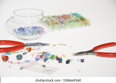 Colored Beads And Tools For Making Jewelry