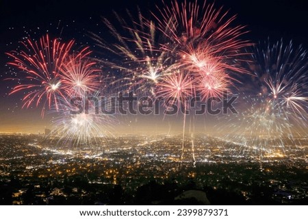 Colored bright fireworks in the night sky,