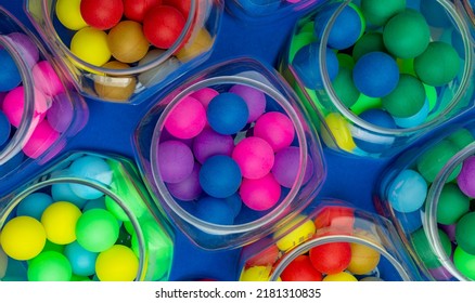 Colored Candies In A Jar, Cachou, Colored Balls. Multi-colored Taw Toy. Base For Design Nice Backdrop, Wallpaper, Poster. Noisy Surface Texture. Top View, Flat Lay