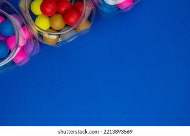 Colored Candies In A Jar, Cachou, Colored Balls. Multi-colored Taw Toy. Base For Design Nice Backdrop, Wallpaper, Poster. Noisy Surface Texture. Top View, Flat Lay