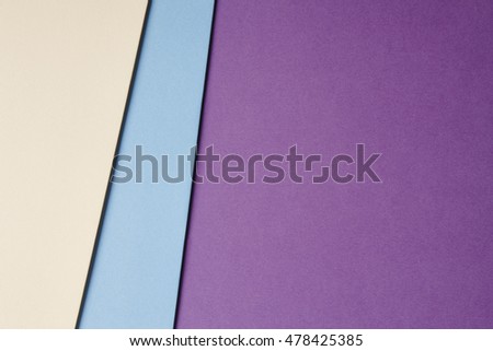 Colored cardboards background beige blue purple tone. Copy space. Horizontal
