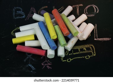 Colored Chalk On A Blackboard