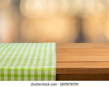 Colored Checked Tablecloth On Wooden Table