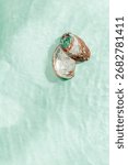 Colored closeup shells floating on waves green blue sea water at sunlight. Beauty nature textured  Seashells, marine life, nautical style, Minimal summer aesthetic, beach lifestyle, soft pastel color