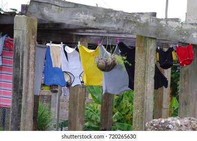 Colored clothes drying outside.