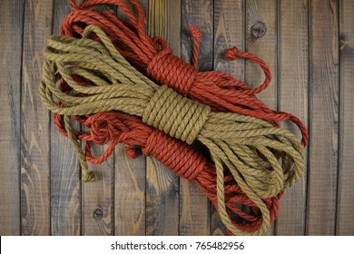 
Colored coils of natural jute rope for shibari (kinbaku) Japanese BDSM fetish bondage practice, adult sex toys