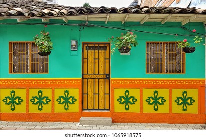 colored colombian facades. oldtown in Colombia  - Shutterstock ID 1065918575