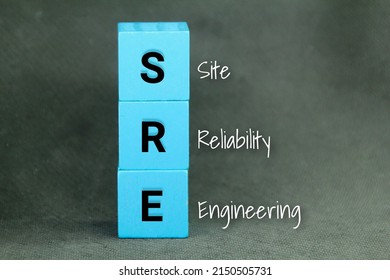 Colored Cubes With The Letter SRE Or The Word Site Reliability Engineering Concept