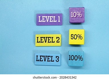 Colored Cubes With The Words Level 1, Level 2 And Level 3