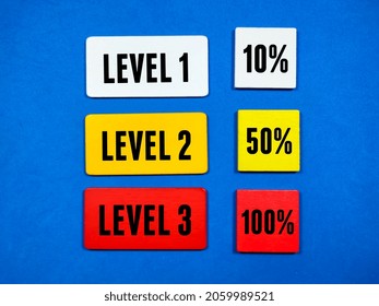 Colored Cubes With The Words Level 1, Level 2 And Level 3