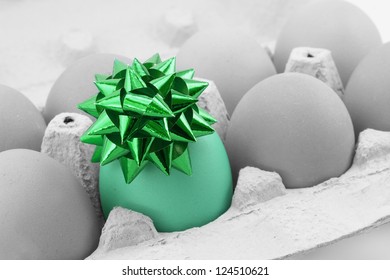 colored egg with bow