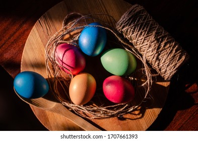 Colored Eggs On A Wooden Table. Easter Celebration, Holidays, Traditions, Cooking.