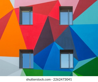 colored facade forming triangles and four windows
