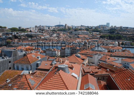 Colored facades and roofs of houses in Porto, Portugal. Porto is the second-largest city in Portugal after Lisbon