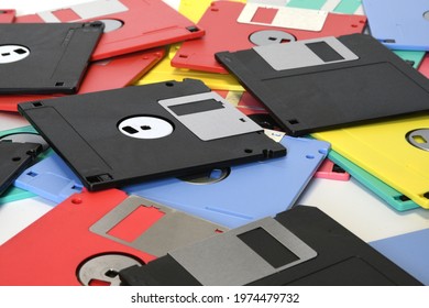colored floppy diskettes isolated on white