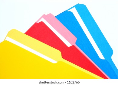 Colored Folders On A White Background Stacked