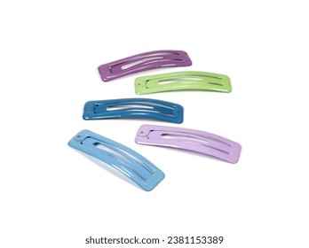 Colored hair clips isolated on white background.