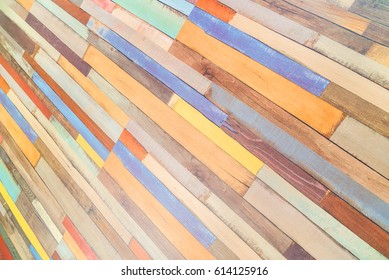 Colored horizontal rectangular tiled background with outlook on the diagonal yellow, red, white, black pattern. Multicolor tiles